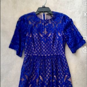 Beautiful lace mini dress with pockets